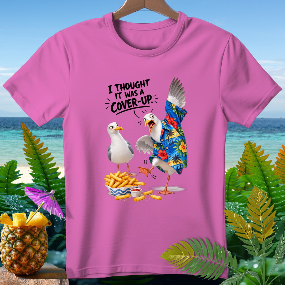 Pink t-shirt with seagulls and the text "I thought it was a cover-up."