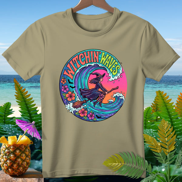 T-shirt with "Witchin' Waves" text and a witch flying on a broom over a wave.