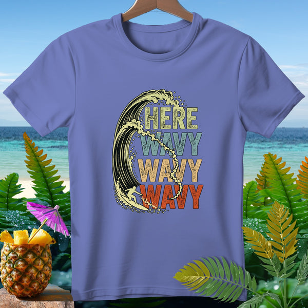 Purple t-shirt with "HERE WAVY WAVY WAVY" text and surfing wave graphic.