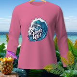 Pink long sleeve shirt with a dolphin riding a wave and 