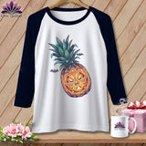 Baseball raglan shirt with jack-o'-lantern pineapple graphic and hanging bats.