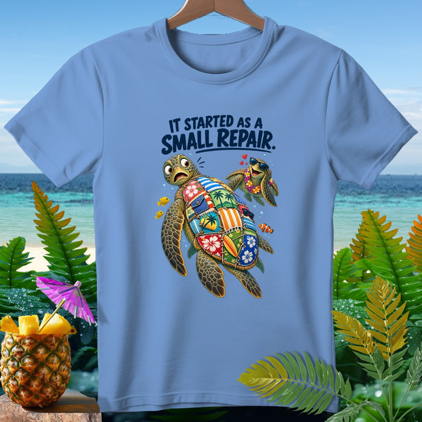 Two turtles, one with a patchwork shell, on a blue t-shirt with text "IT STARTED AS A SMALL REPAIR."