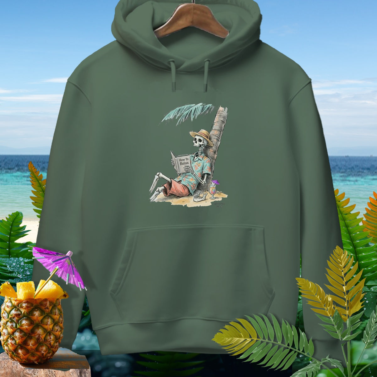 Skeleton reads "How to Relax" book under palm tree on beach with pineapple drink.