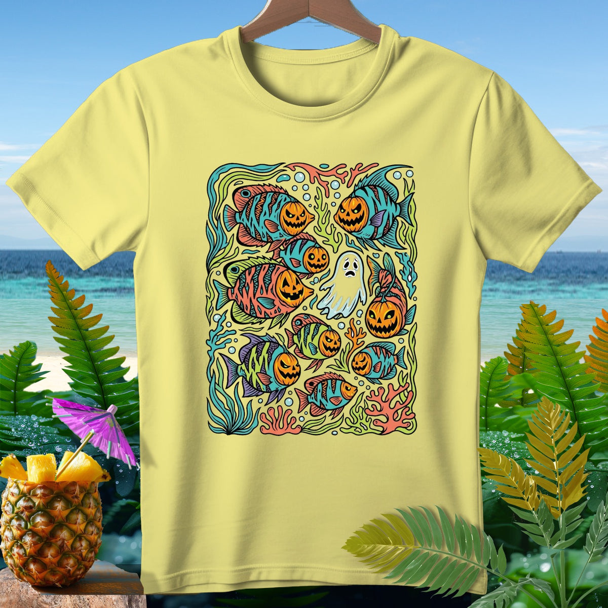 Yellow t-shirt with a Halloween-themed design of fish with jack-o'-lantern faces and a ghost.
