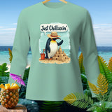 Penguin wearing a hat builds a sandcastle with a bucket, text 
