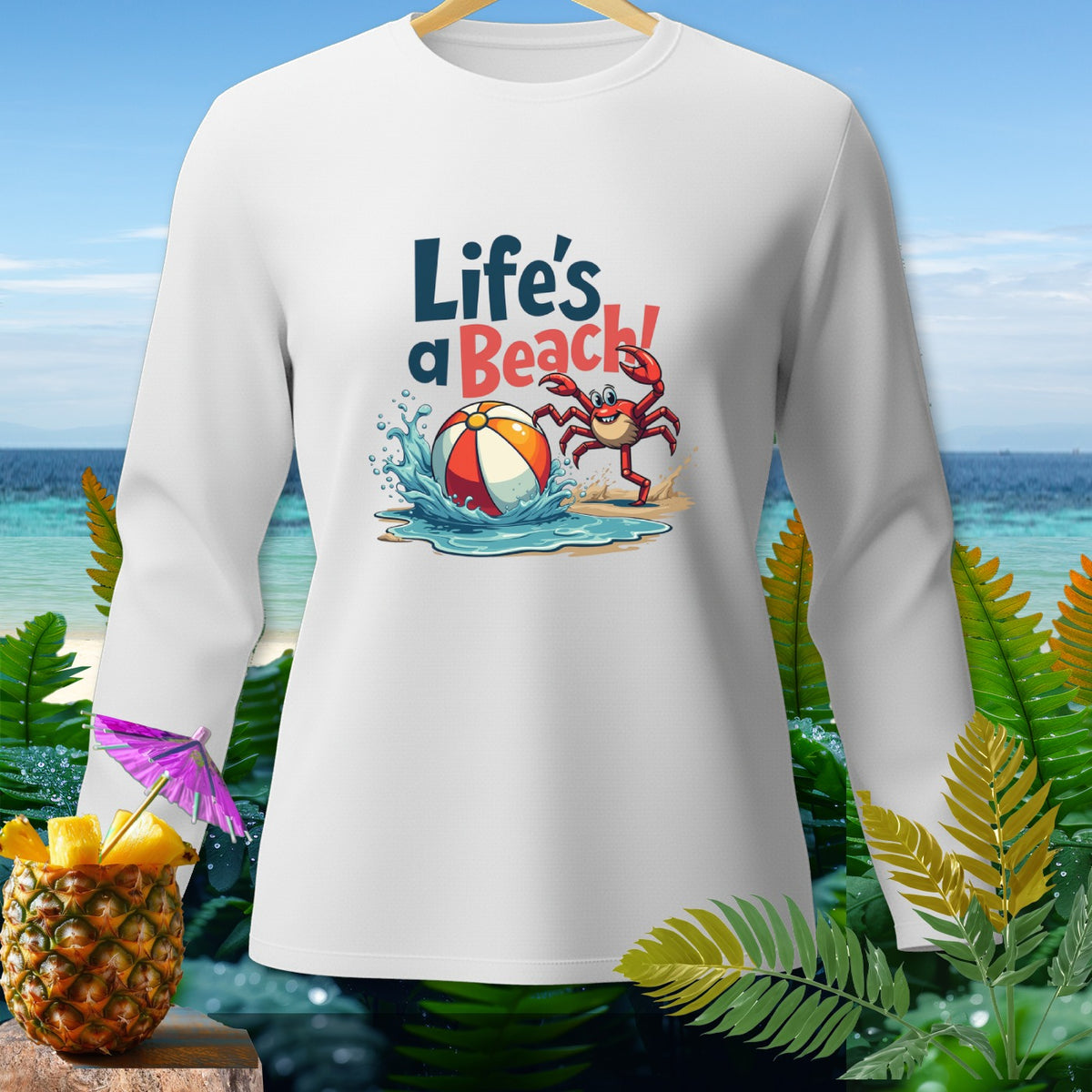 White long-sleeve shirt with cartoon crab, beach ball, and text "Life's a Beach!".