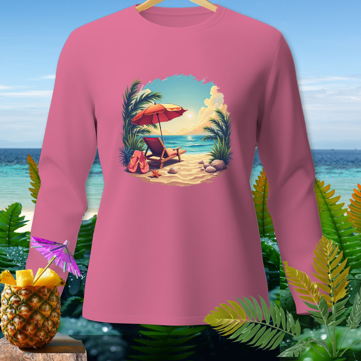 Pink long-sleeve shirt with beach scene graphic: lounge chair, umbrella, flip-flops.