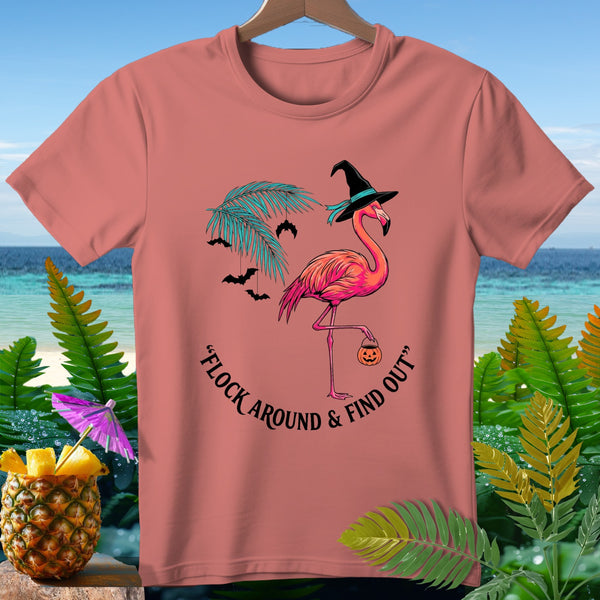 Pink t-shirt with Halloween flamingo, witch hat, pumpkin, and bats.