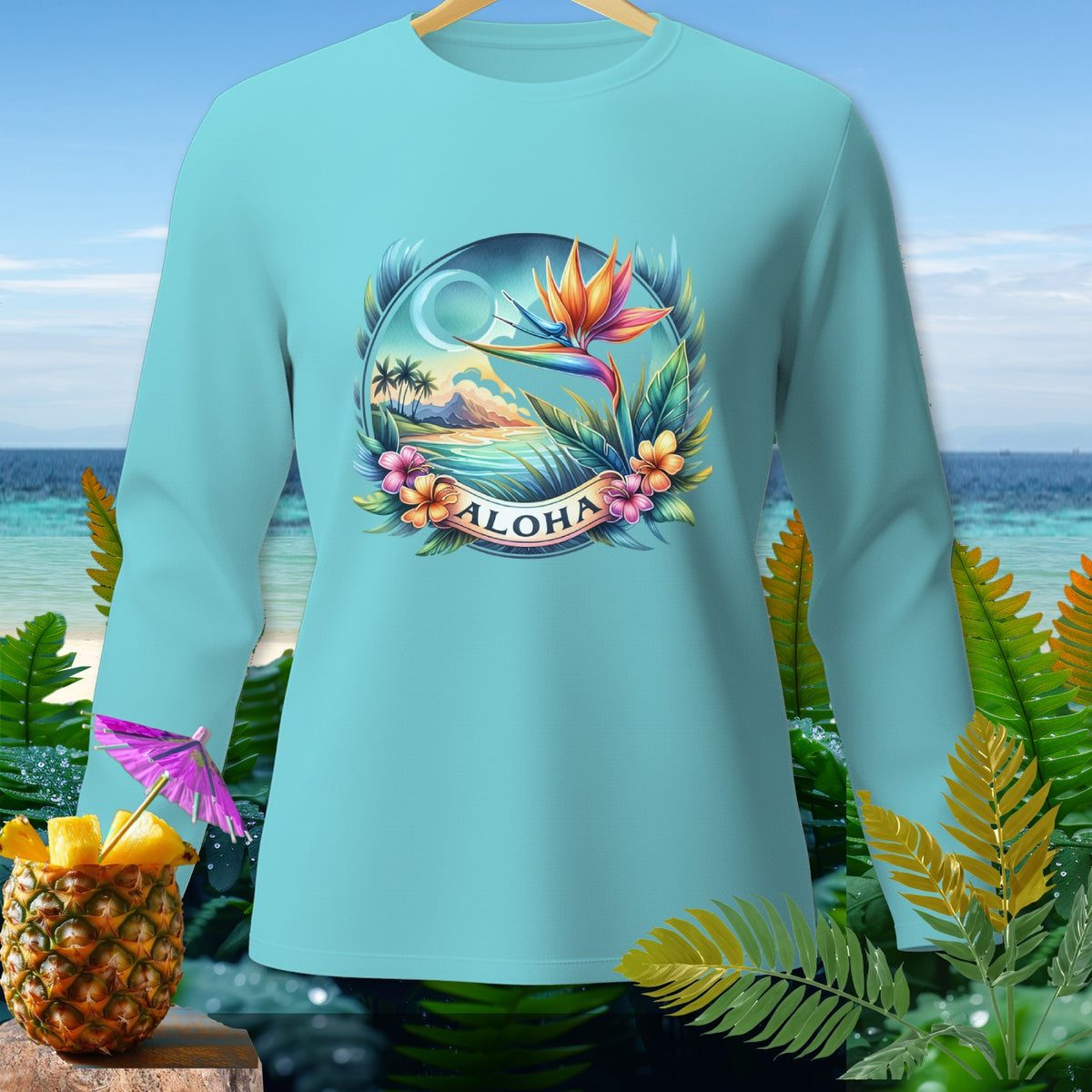 Light blue long-sleeved shirt with a tropical paradise graphic and the word "ALOHA".