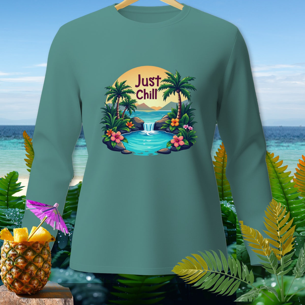 Teal long-sleeve shirt with a "Just Chill" tropical waterfall graphic.