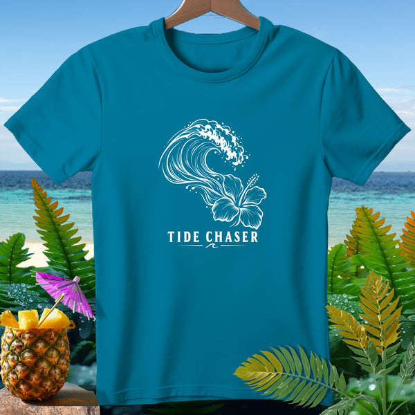 Teal t-shirt with white wave and hibiscus graphic and "Tide Chaser" text.