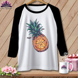 Raglan t-shirt with jack-o'-lantern pineapple graphic and small bats.
