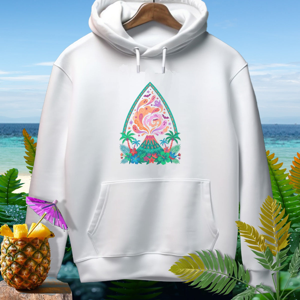 White hoodie featuring a tropical volcano graphic with ghosts and bats.