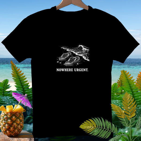 Black t-shirt with flip-flops on a beach and the text "NOWHERE URGENT."