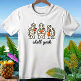 White t-shirt with three cartoon turtles holding drinks and the text 