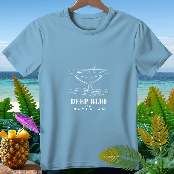 Light blue t-shirt with white whale tail design and text "DEEP BLUE DAYDREAM".