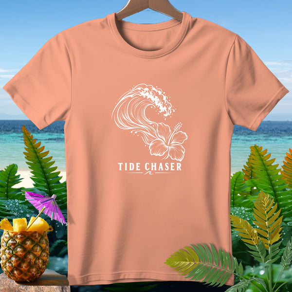 Peach t-shirt with white wave and hibiscus graphic, and "TIDE CHASER" text.