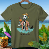 Skeleton in Hawaiian shirt drinks coconut with straw, shark fin visible.