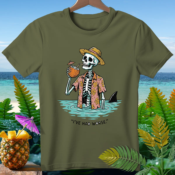 Skeleton in Hawaiian shirt drinks coconut with straw, shark fin visible.