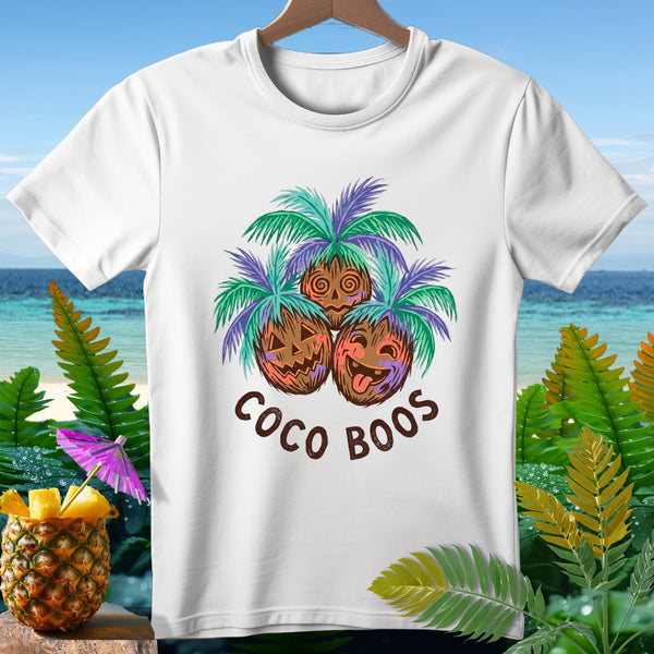 White t-shirt with a "Coco Boos" graphic of three cartoon coconuts and palm fronds.