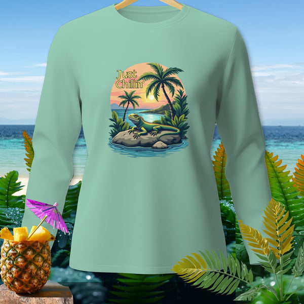 Mint long-sleeve shirt with "Just Chillin'" graphic of an iguana by a tropical sunset.