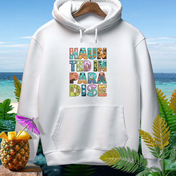 White hoodie with "Haunted in Paradise" text featuring Halloween and tropical elements.