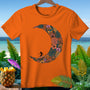 Orange t-shirt with a crescent moon graphic filled with tropical leaves and flowers, featuring a surfer.