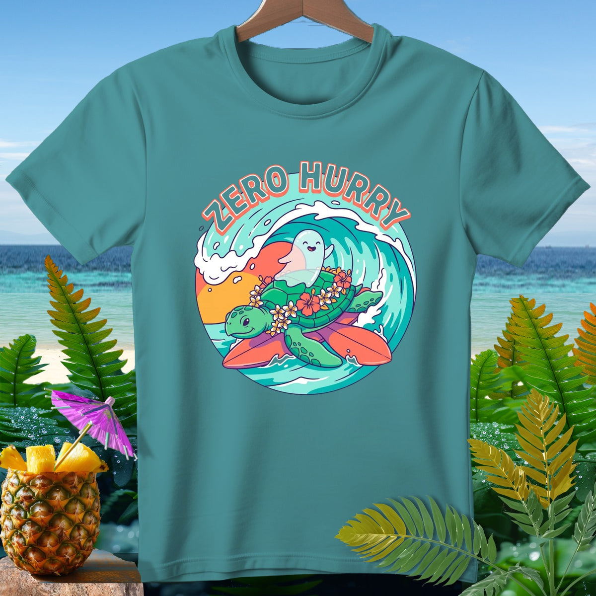 Teal t-shirt with cartoon turtle and ghost surfing on a wave, reading "Zero Hurry".