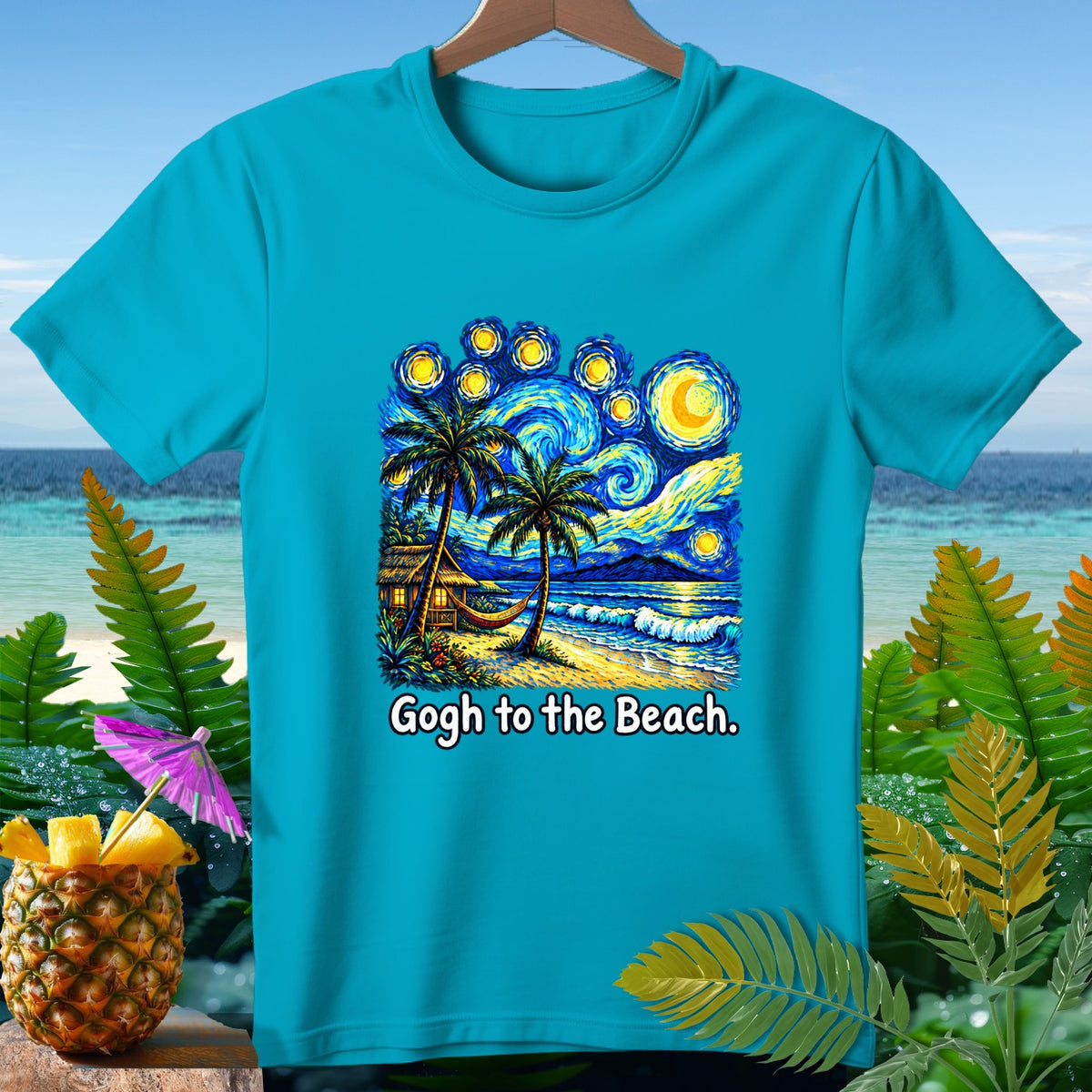Blue t-shirt with a Starry Night beach scene and text "Gogh to the Beach."