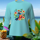 Teal long-sleeve shirt featuring a colorful macaw among hibiscus flowers.