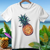 White t-shirt with jack-o'-lantern pineapple graphic and hanging bats.