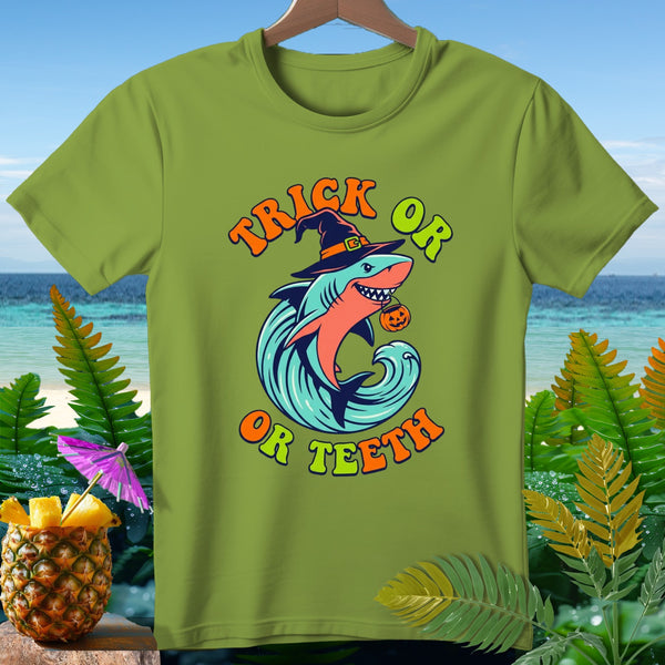 Green t-shirt with shark wearing witch hat and holding pumpkin, text "Trick or Teeth".