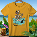 Skeleton in ocean drinking from pineapple with shark fin and text 