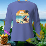 Purple long sleeve shirt with beach graphic and text 