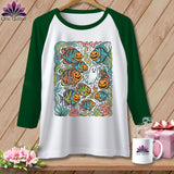 Raglan sleeve shirt with Halloween fish and pumpkin faces graphic.
