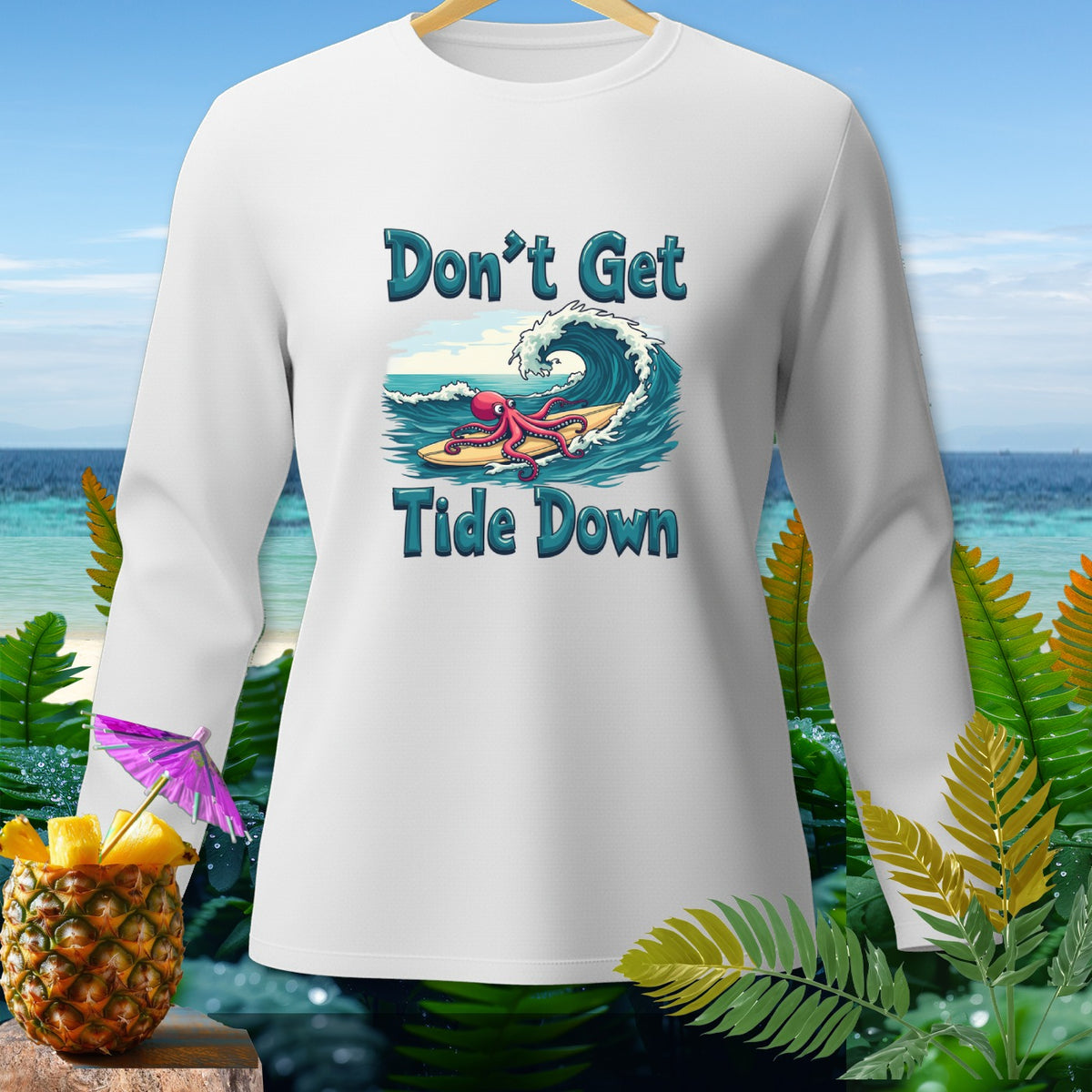 White long-sleeve shirt with "Don't Get Tide Down" text and octopus surfing a wave.