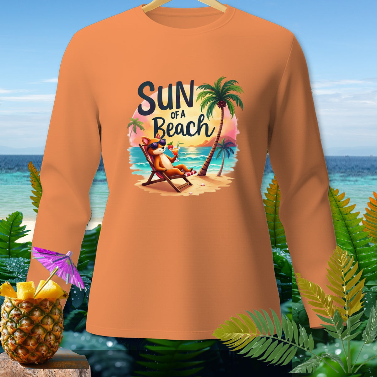 Orange long-sleeve shirt with cartoon fox on beach and text "SUN of a Beach".