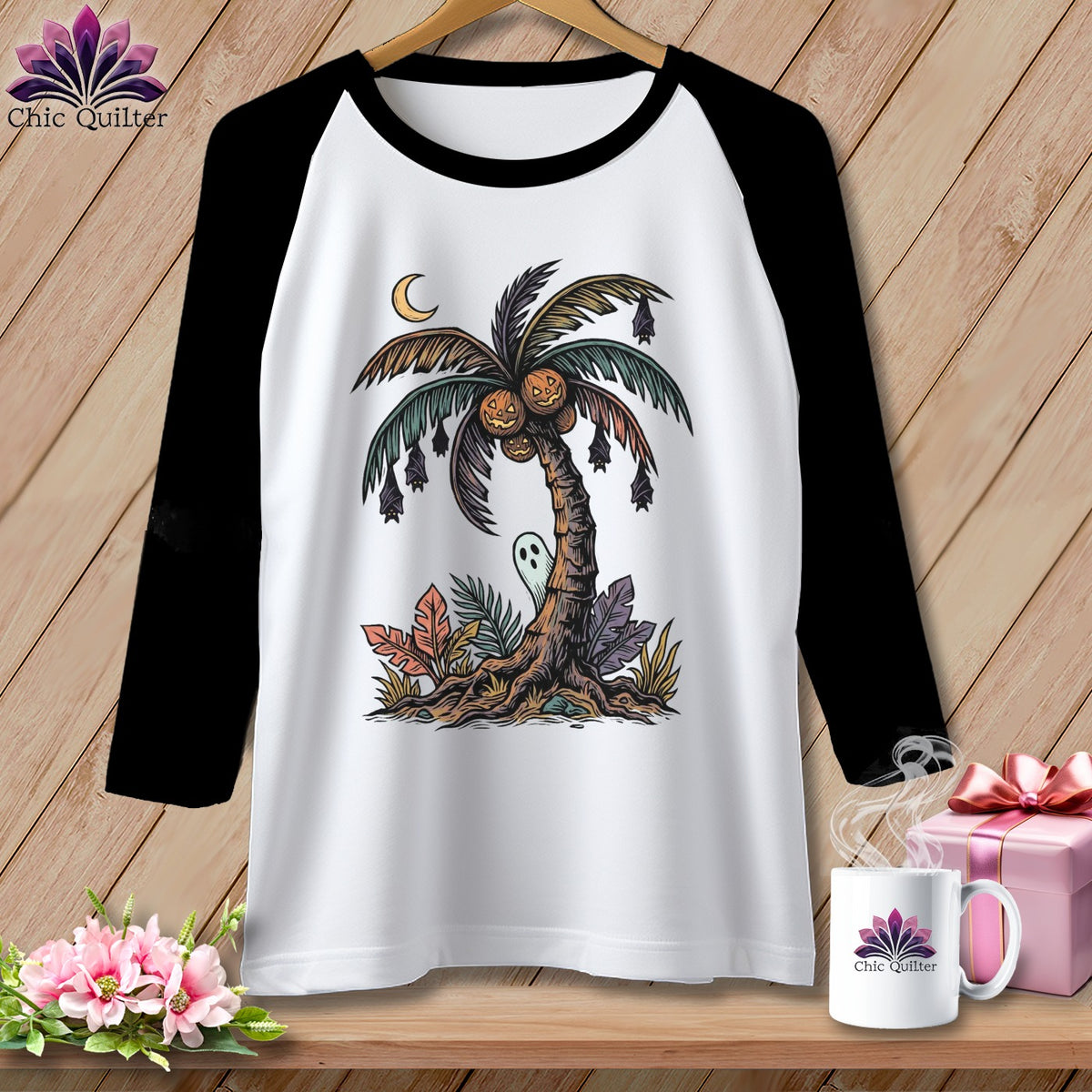 White baseball tee with Halloween palm tree graphic and Chic Quilter logo.