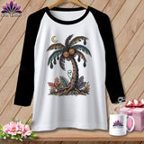 White baseball tee with Halloween palm tree graphic and Chic Quilter logo.