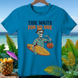 Skeleton surfer with a pumpkin candy bucket and surfboard, text 