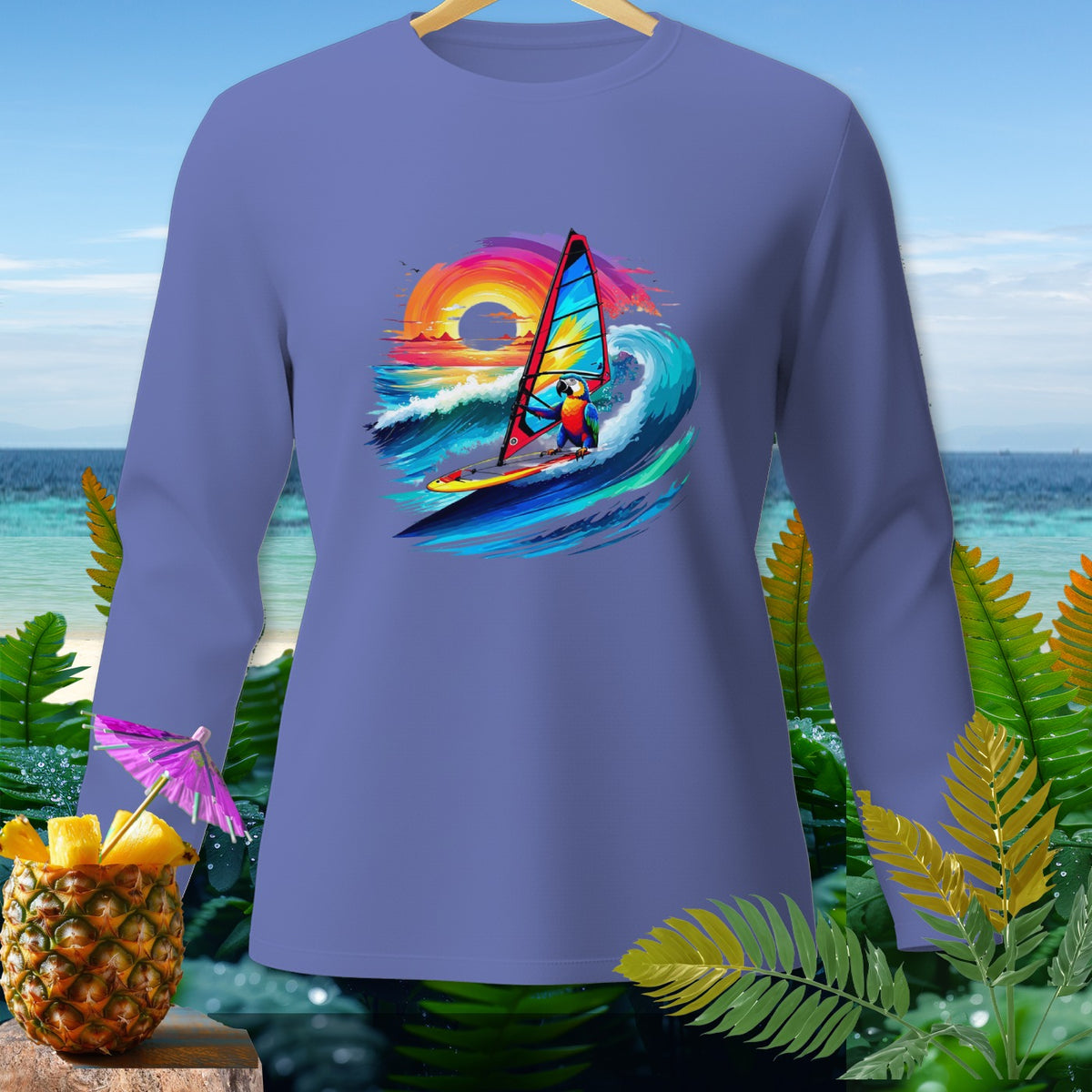 Long sleeve shirt with a parrot windsurfing at sunset with tropical foliage and pineapple drink.