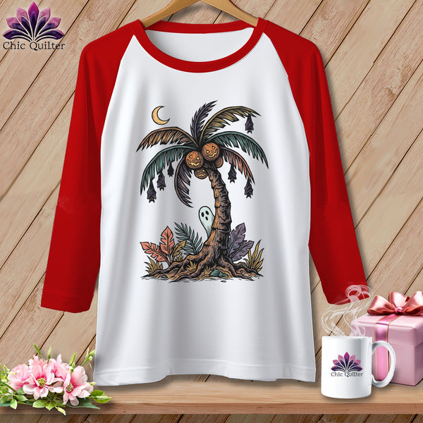 White raglan shirt with Halloween palm tree design featuring pumpkins, bats, and ghost.