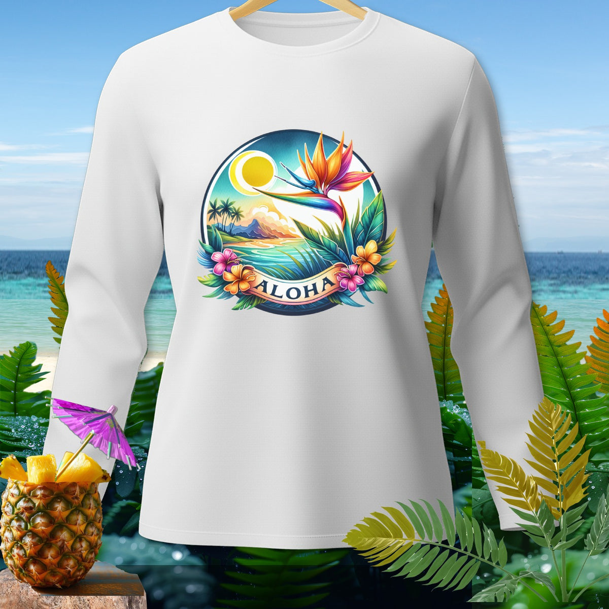 White long-sleeve shirt with a tropical "Aloha" graphic, featuring a bird of paradise and beach scene.