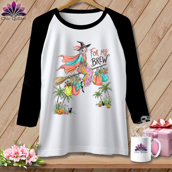 T-shirt graphic of a witch flying on a broom with shopping bags and text "For My Brew".