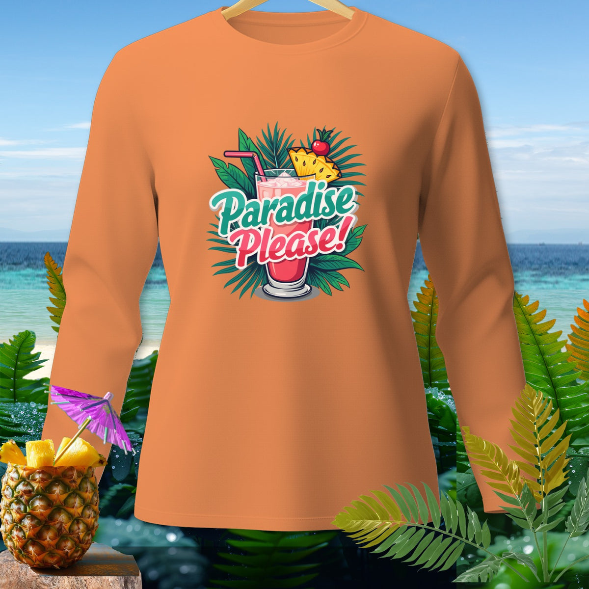 Orange long-sleeve shirt with "Paradise Please!" cocktail graphic and tropical background.