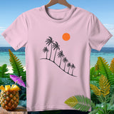 Pink t-shirt with black palm trees, orange sun, and tropical beach background.