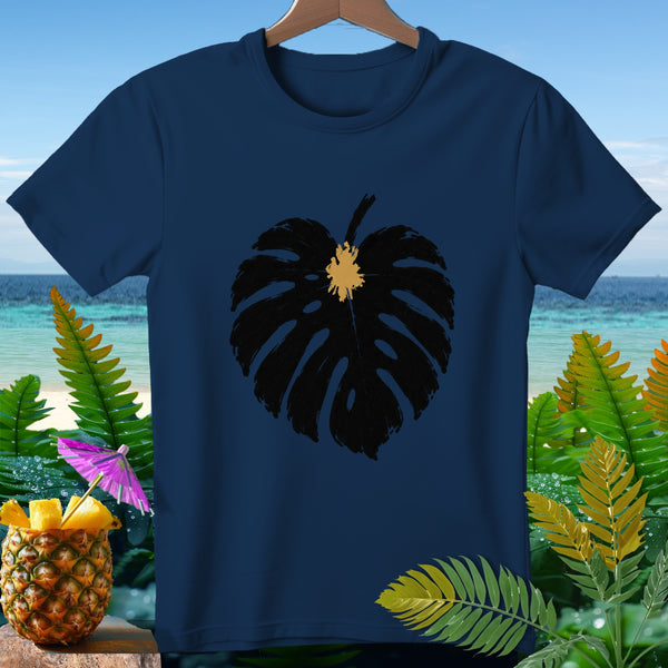 Navy t-shirt with black monstera leaf graphic, tropical background.