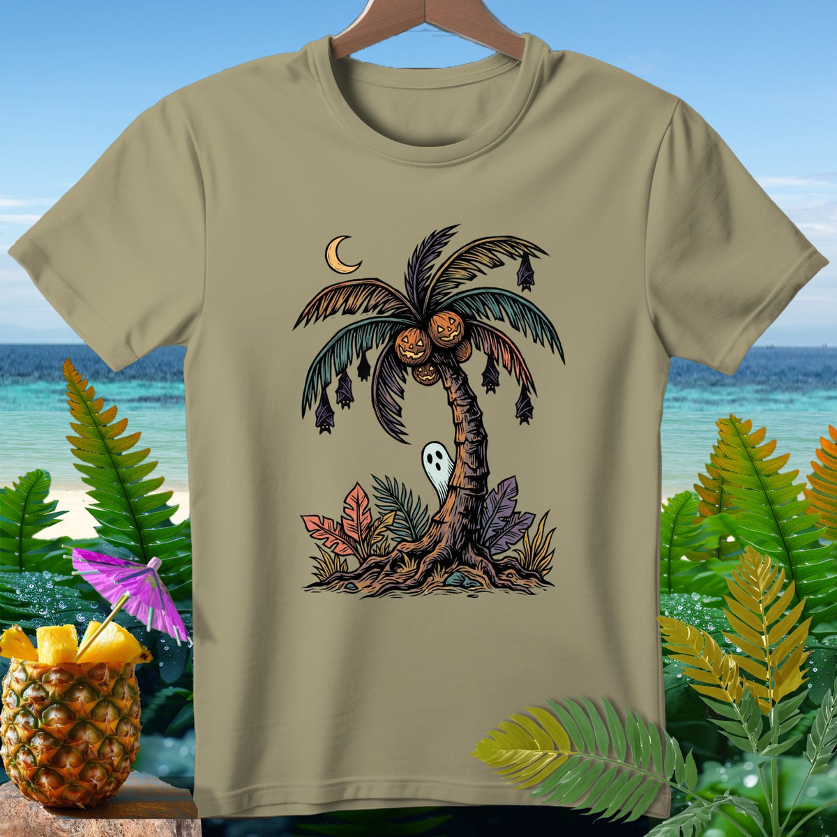 T-shirt with a Halloween palm tree, moon, bats, pumpkins, and a ghost.