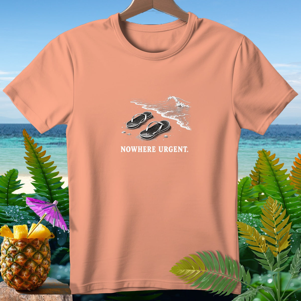 Peach t-shirt with flip-flops on a beach and text "NOWHERE URGENT."