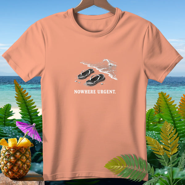 Peach t-shirt with flip-flops on a beach and text "NOWHERE URGENT."